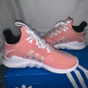 Women’s pink and white EQT’s